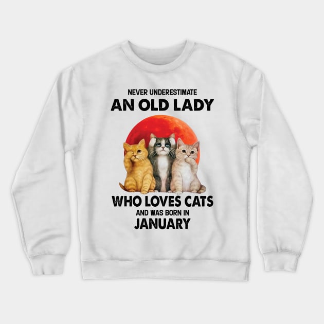 Never Underestimate An Old Lady Who Loves Cats And Was Born In January Crewneck Sweatshirt by Bunzaji